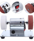 Compact Desktop Sanding And Polishing Machine With Easy As Pie Plug And Go Setup showing motor, switch, and sanding wheels.