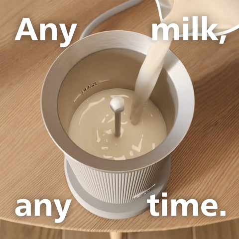 Baristina Milk Frother For Espresso Machines Froths Hot Or Cold Dairy And Non Dairy Milk Perfect Latte Art Easy To Clean Black Finish For Home Barista Vibe, top view pouring milk