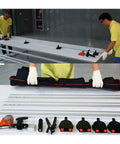 Two users setting up the Heavy Duty 3200Mm Manual Tile Cutter For Large Format Porcelain Stoneware with sliding rails.