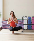 Rock Solid Black Yoga Mat Storage Rack With Smooth Rolling Wheels For Home Gym Studio Setup Holds Foam Rollers Resistance Bands And Straps Clean All Week Long with yoga mats displayed.