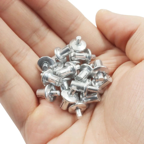 M5 7Mm Aluminum Core Rivets 100 Piece Pack Heavy Duty Drive Pins in a hand for quick DIY projects and repairs.