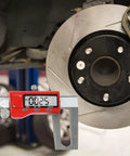 Digital Brake Disc Caliper 0-150mm Stainless Steel LCD Electronic Vernier measuring brake disc thickness during auto repair.