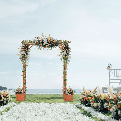 Wooden Garden Arbor With Planter Boxes And Wedding Arch For Outdoor Ceremony, Trellis For Climbing Plants, Easy Setup Pergola For Backyard Or Lawn, Durable Fir Wood In Golden Brown Finish in garden setting with floral decorations.