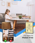 Child reading at a table with FCC-certified flicker-free lighting from Five To Six Inch LED Recessed Can Lights 12 Pack.