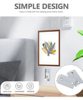 Heavy Duty Stainless Steel Picture Hangers Built Tough Wall Mount Brackets For Mirrors And Artwork Four Pack displayed with a framed artwork.
