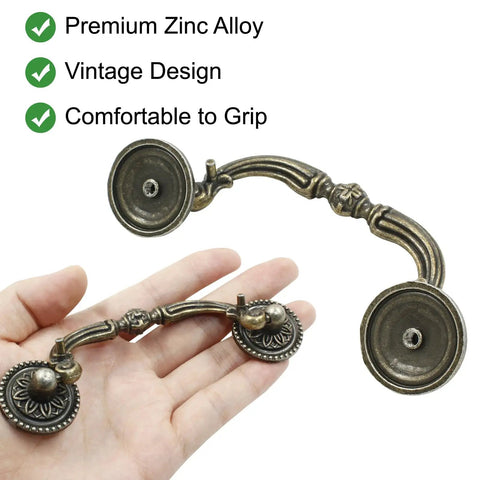 8 Pack 3.5 Inch Center Pull Cabinet Handles Antique Bronze Dresser Knobs With A Classic Retro Look Hella Durable Heavy Duty Drawer Hardware For Kitchen Cupboards And Home Upgrades Slick Feel And Quick Grip Installation in hand showing curved design