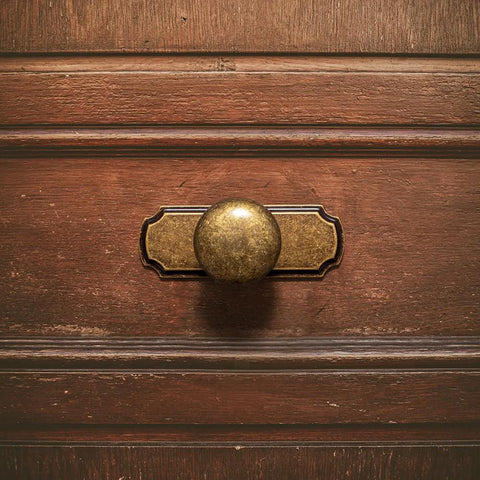 Retro Antique Brass Zinc Alloy Cabinet Knob With Backplate installed on wooden drawer, distressed metal hardware, durable corrosion resistance