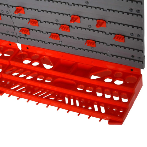 Close-up view of the pegboard hooks and red shelf from 54 Piece Wall Mounted Pegboard And Shelf Tool Organizer Kit Slick Gray Storage Solution.