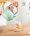 Cast Iron Teapot With Stainless Steel Infuser For Stovetop Brewing, 32 Oz Capacity, Enamel Interior, Leaf Design, Light Green