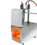 Dual Burner Propane Blacksmith Forge With One Side Door 2600F Rated Heat, stainless steel structure with visible flames inside.