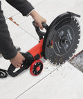 Job Site Ready 16 Inch Wet Dry Electric Concrete Cutting Saw With Integrated Water Pump And Extended Hose For Crisp Dust Free Grooving On Granite Tile Stone Wood And Brick Works Heavy Duty 4000 Watt Power Rig in use cutting through tile.