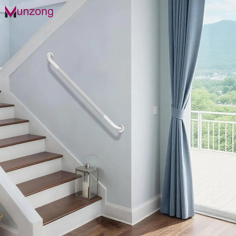 Built Like A Tank Anti Slip Shower Grab Bar Kit With Reliable Stability That Never Lets You Down Includes Three Wall Mount Handrails Perfect For Senior Bathrooms And Easy Bathroom Upgrades In Clean White, featuring a white handrail on a wall near stairs.