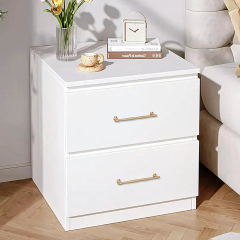 Real Deal Solid Brass Cabinet Pulls With Slick Brushed Gold Finish on white nightstand with two drawers, 7 1/2 inch span.