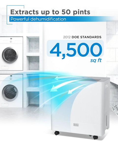 Heavy Duty Portable 50 Pint Dehumidifier For Damp Basements And Closets With Continuous Drain Hose And Removable Bucket next to washer.