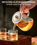 Pouring tea from Stovetop Safe Glass Teapot 550ml With Removable Stainless Steel Infuser into cups, ideal for easy pour and clear brewing