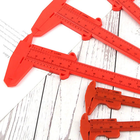 Depth Vernier Caliper 3inches, 6inches Depth Vernier on wooden surface, showcasing clear markings and lightweight plastic design.