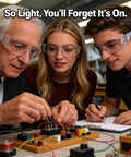Shop Ready 12 Pack Safety Glasses For The Daily Hustle And Sports, Ansi Z87.1 Rated worn by three people working on electronics.
