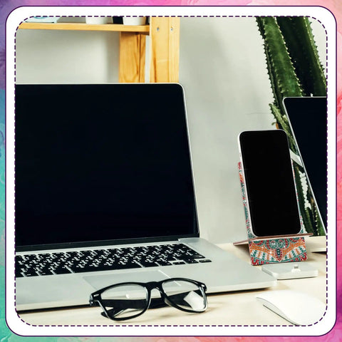 Desktop setup with laptop, glasses, and phone on 4 Pack Large Mandala Diamond Painting Phone Stand Kit 5.5 Inch DIY Full Drill