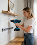 Heavy Duty 21V Brushless Cordless Drill Set With Badass Torque Two Speed Modes And Complete Screwdriver Bits For Concrete Metal Chores And Rapid Pro Diy Builds Today in use, drilling into a wall.