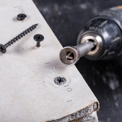 Drilling board with Number Eight By Five Eighths Inch Flat Head Phillips Wood Screws In Black Oxide Coated Stainless Steel 18 8 A2