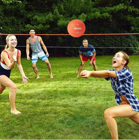 Go To Backyard Volleyball Kit For Ultimate Family Fun Easy Setup Portable Outdoor Recreation Gear in action with players.