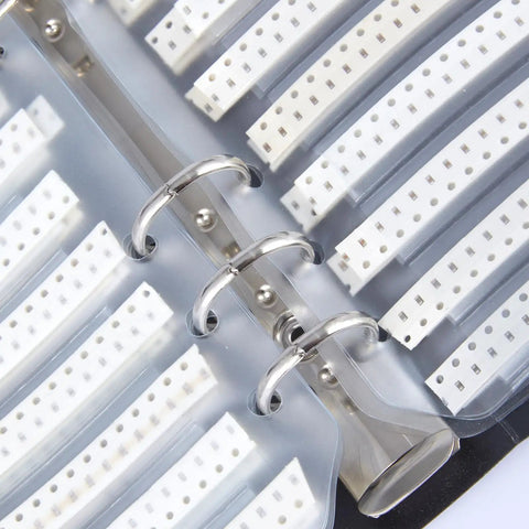 SMD 0603 Capacitor Kit Serving A Badass 2250 Piece Ceramic Chip Assortment with organized compartments and silver rings.