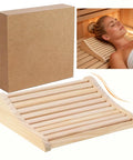 Upgraded Handcrafted Hemlock Wood Sauna Pillow For Head Neck And Shoulder Support Curved Ergonomic Design displayed with packaging.
