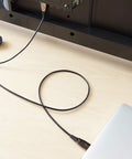 50 Ft HDMI Fiber Optic Cable Featuring Gold Plated Connectors 18Gbps Throughput Ultra HD 4K At 60Hz Supports Ethernet connected to a TV.