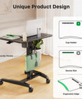 Height Adjustable Rolling Laptop Desk With Cup Holder And Wheels 27 Inch Portable Sit Stand Workstation On Pneumatic Lift Ergonomic Curved Desktop For Comfortable Working Black, showing unique design features like sturdy hooks, device slot, and ergonomic edge.