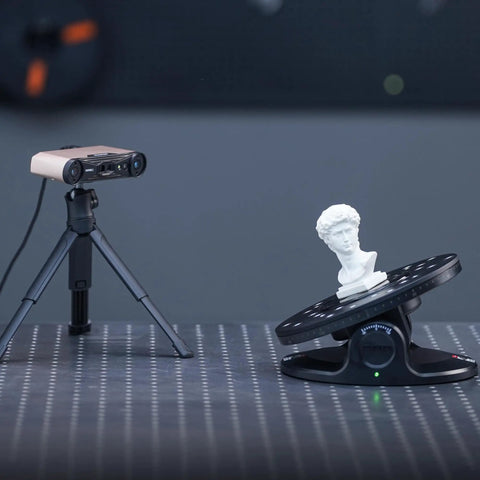 Dead On Accurate Dual Axis Turntable For Seamless 3D Scanner Accessory with a small bust sculpture on a black rotating platform.