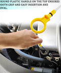 Person using Oil Dip Stick For Quick Engine Oil Level Check With Easy Pull Ring, Stainless Steel Replacement Gauge in Ford vehicle engine.