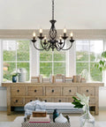 Six Light Farmhouse Candle Chandelier For Living Room And Kitchen in cozy farmhouse decor, matte black, rustic industrial design.