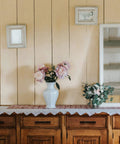 Straight Up Gorgeous Matte Black Cabinet Handles 5 Inch Length With 3 Inch Hole Center Damn Clean Kitchen Drawer Pulls And Wardrobe Cupboard Knobs Easy Install 6 Pack Real Deal Upgrade displayed on a wooden cabinet with decorative vases.