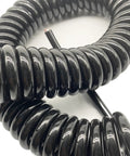 Tough As Nails Coiled Extension Cord With 6 Meter Extra Reach, Heavy Duty 4 Core Pure Copper Spiral Power Cable, close-up of coiled black cable.