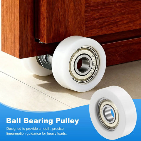 Close-up of Ten Pack Nylon Guide Pulley Rollers With Ball Bearings slick action under furniture, ideal for 10mm shafts, 38mm wheels.