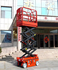 Heavy Duty Scissor Lift Platform For Smooth Station Connection And Quick Material Height Adjustment Transform Your Workshop Workflow While Safely Moving Big Loads With Zero Sweat Now, positioned near building entrance.