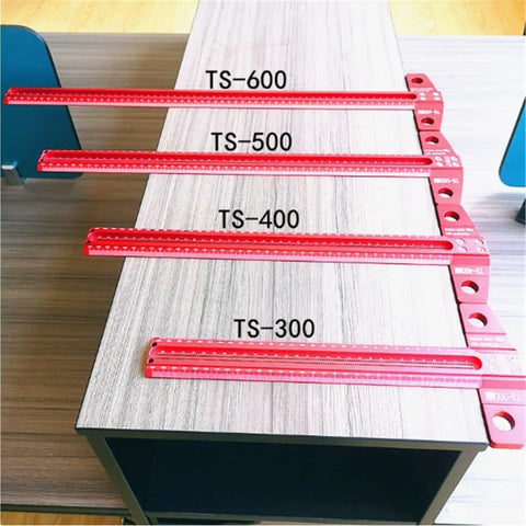 Four sizes of Digital Caliper, Carpenter’s Marking Ruler Square Perforated T-Square Tool on a wooden surface.