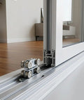 Heavy Duty Sliding Window Rollers With Rustproof Steel Pulleys And Mounting Hardware For Smooth Quiet Door Track Kits That Run Smooth As Silk No Sweat Guaranteed, showing a close-up of the rollers installed in a door track.