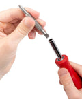 Inserting a bit into Six In One Phillips And Slotted Multi Bit Driver Kit With Handy Compact Handle and Nut Driver Bit Tube