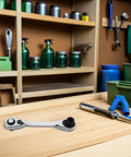 Mini One Quarter Inch Drive Reversible Ratchet Socket Wrench For Hex Bolts And Tight Squeeze Spots on a workbench.