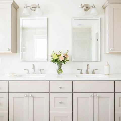 Bathroom scene with mirrors and sinks, featuring 30 Pack Kitchen Cabinet Knobs In Brushed Nickel Silver Pull Hardware For Drawers And Doors Easy Install Cabinet Knobs With Long And Short Screws Perfect For Kitchen Cupboard Dresser And Closet on cabinetry.