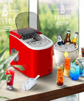 Fast Freeze Countertop Ice Maker Produces Nine Fresh Cubes In Eight Minutes with drinks and ice bucket on a table.