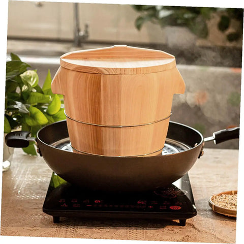 Premium Handcrafted Wood Steamed Rice Bucket With Lid, Round Beige Cask Storage Bin in black pot on kitchen counter.