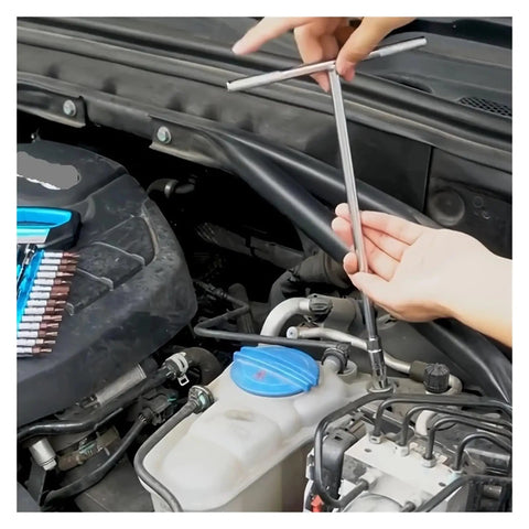 Person using Complete 4 Piece Hex Socket Wrench Set Featuring Hella Durable Steel Allen Keys in 8 10 12 14 Mm Sizes for vehicle maintenance.