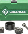 Knockout Punch Driver Kit For One And One Half Inch And Two Inch Holes Manual Round Punch Set With Slug Buster next to green case