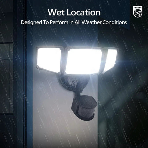Kickass Outdoor LED Security Flood Light With Smart PIR Motion Sensor and Hella Bright 5000K Daylight Illumination mounted, weatherproof in rain.