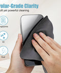 Hand using 10 Pack Microfiber Cleaning Cloths For Electronics, Camera Lenses, Eyeglasses, Phones And Laptops Safe Gentle Wipe Kit