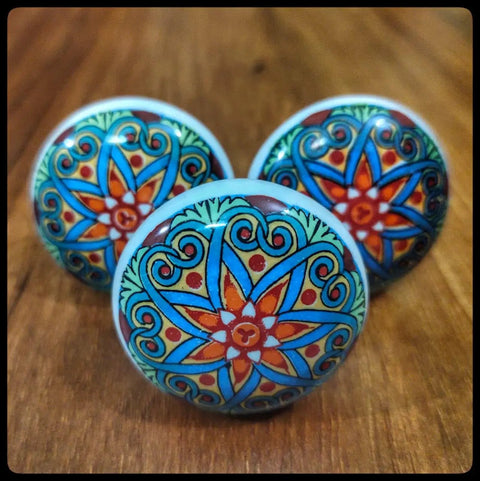 Flat Out Gorgeous Hand Painted Ceramic Drawer Knobs And Snazzy Floral Cabinet Pulls With Vibrant Blue Red Green Designs For Kitchen Bathroom Furniture Upgrades Set Of Six, round ceramic knobs with floral patterns.