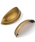Hard-As-Nails 10 Pack Antique Brass Cabinet Cup Pulls With 3 Inch Hole Center, two heavy duty zinc alloy handles displayed.