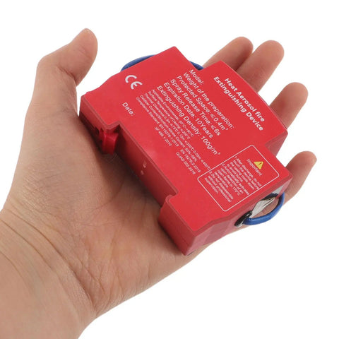 Slick Automatic Aerosol Fire Extinguisher With Smart Sensor Detection in hand, compact size for cars and trucks, easy to use.